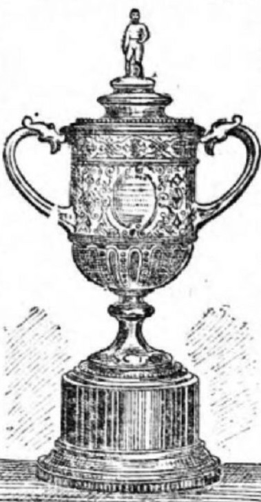 The original FA Cup trophy, a small silver cup on a plinth