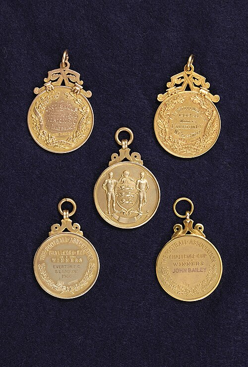 Four Everton FA Cup winners' medals displayed together