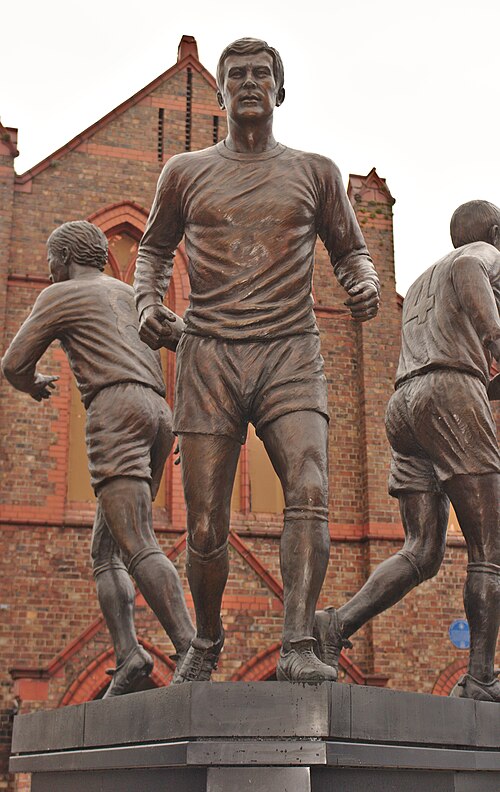 A bronze statue of the Everton footballer Colin Harvey outside Goodison Park