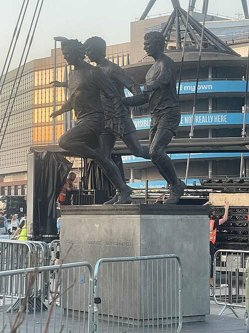 Statue of Colin Bell, Francis Lee and Mike Summerbee outside the City of Manchester Stadium