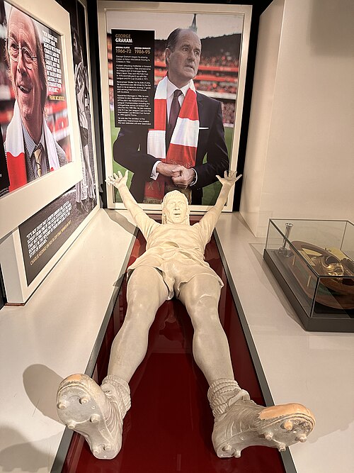 The Charlie George figure on display in the Arsenal Football Club Museum