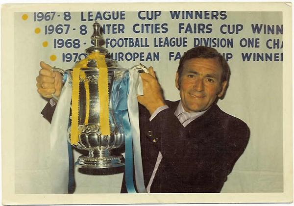 The Leeds United trainer Les Cocker holding the FA Cup in 1972