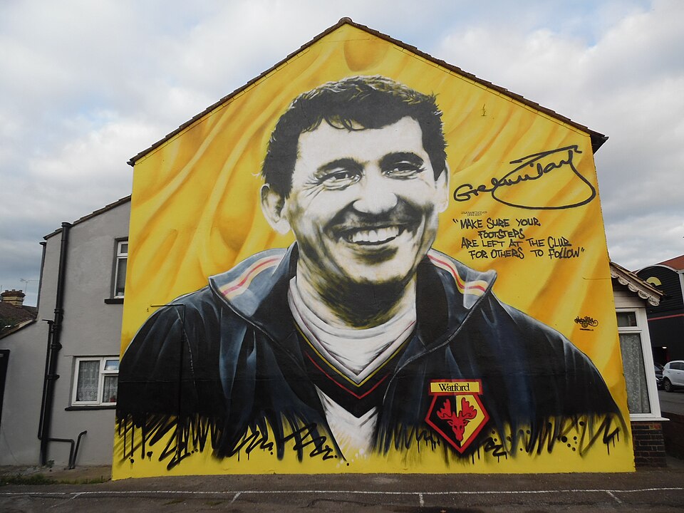 A wall mural of Graham Taylor in Vicarage Road