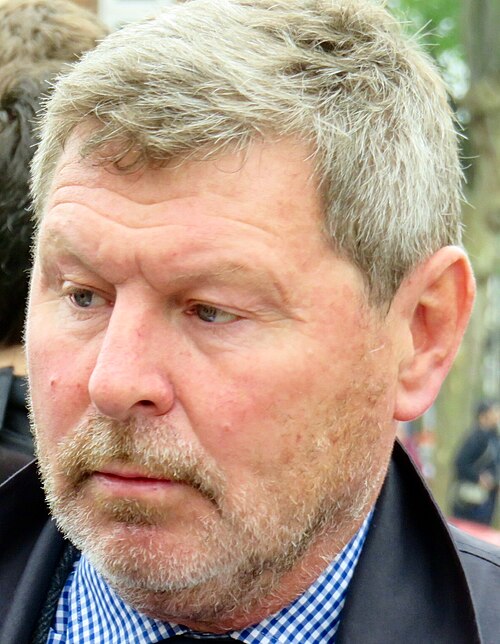 Clive Allen arriving at a stadium