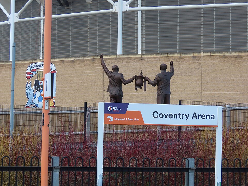 Statues of George Curtis and John Sillett outside Coventry's stadium