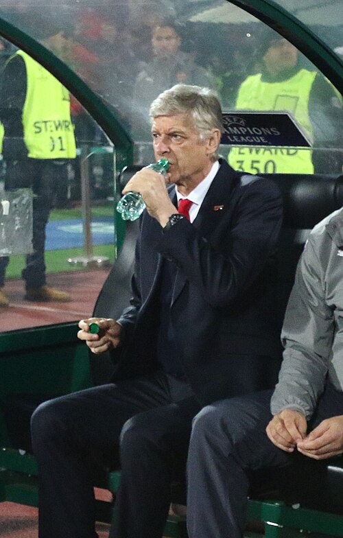 Arsene Wenger watching from the touchline