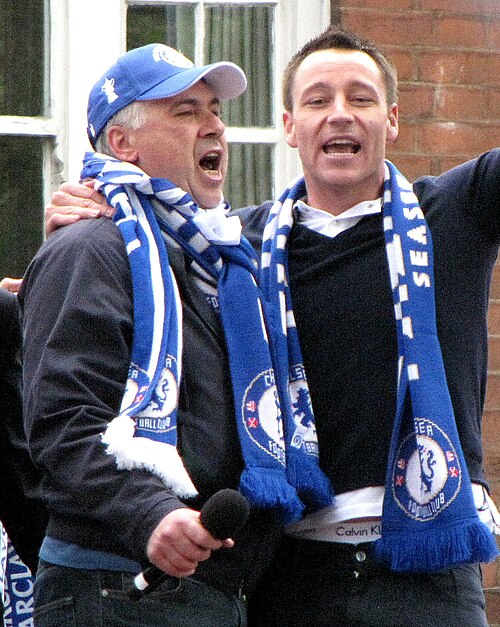 Carlo Ancelotti and John Terry celebrating Chelsea's League and FA Cup Double