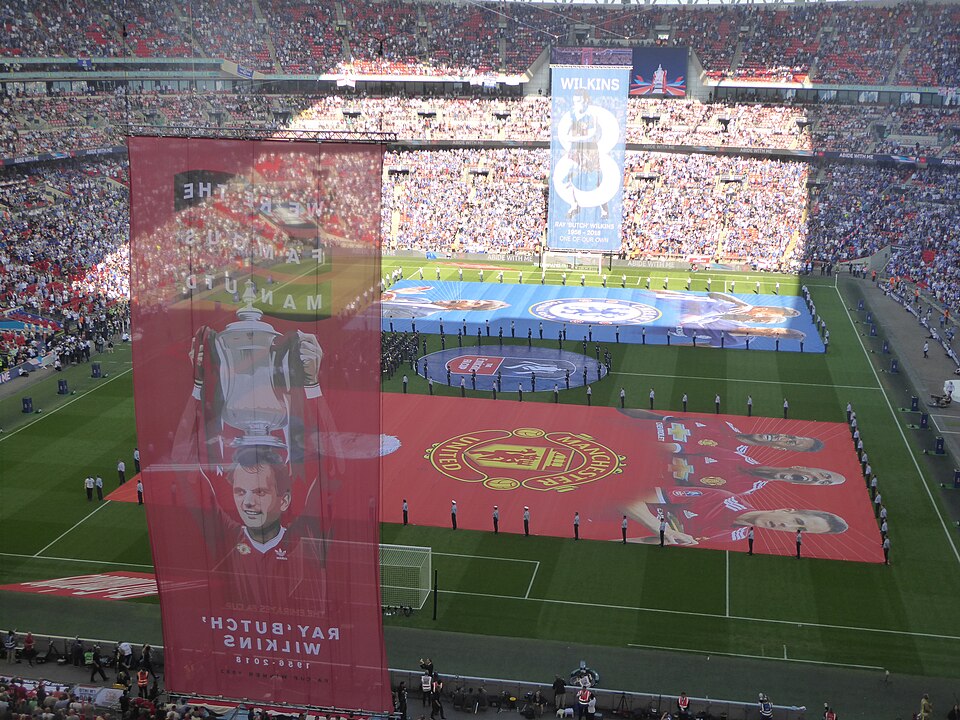 Banners honouring Ray Wilkins are displayed at both ends of Wembley before the 2018 FA Cup final