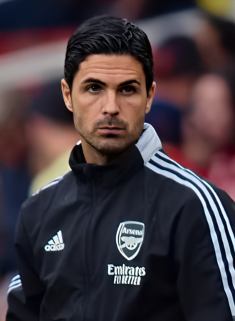Mikel Arteta on the touchline in Arsenal kit