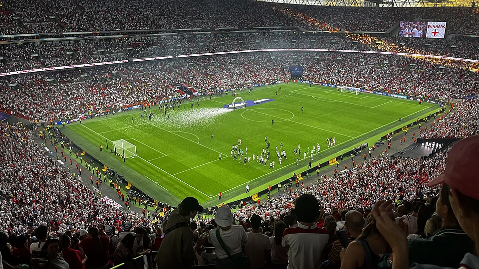Wembley Stadium seen from outside on a summer evening