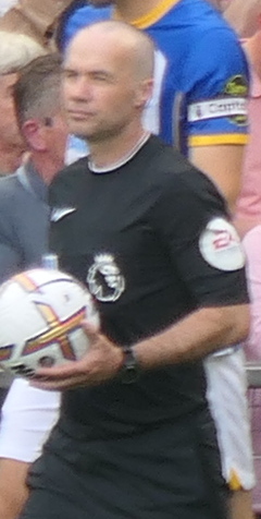 Referee Paul Tierney on the pitch